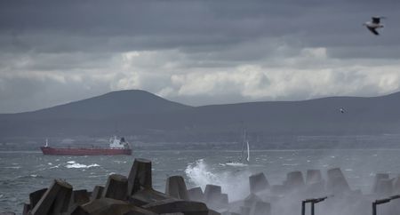 Cold front lashes Western Cape before moving to other parts of SA, bringing snowfall and fierce winds