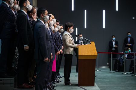 Hong Kong leader says security law will not hurt freedom amid global alarm