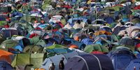Thousands of tents cover the hills of Worthy Farm on the first day of the Glastonbury Festival at Worthy Farm, in Glastonbury, Britain, 26 June 2024. Glastonbury runs from 26 to 30 June 2024.  EPA-EFE/ANDY RAIN