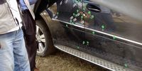 Aiming to kill, some of the bullet holes – marked and numbered with green police stickers – that pierced the car in which Sindiso Magaqa was travelling. Photo: Carien Du Plessis