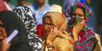Kashmiri people stand in a queue outside a polling station as they wait for their turn to vote in the fifth phase of the Indian general elections in Shadipora, Sumbal area of Bandipora district, north of Srinagar, the summer capital of Indian Kashmir, 20 May 2024. The Indian general elections are held in seven phases between 19 April and 01 June 2024, with the results set to be announced on 04 June 2024.  EPA-EFE/FAROOQ KHAN