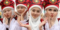  Kyrgyz girls pose in traditional costumes during the Nowruz celebration in Bishkek, Kyrgyzstan, 20 March 2024. Nowruz is the Persian New Year celebrated by various ethnic groups worldwide and it traditionally marks the first day of spring.  EPA-EFE/IGOR KOVALENKO