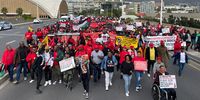 Saftu workers march to the Civic Centre in Cape Town to hand over a memorandum to mayor Geordin Hill-Lewis. (Photo: Victoria O'Regan)