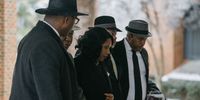 MEMPHIS, TN - FEBRUARY 01: RowVaughn Wells, mother of Tyre Nichols, is walked into Mississippi Boulevard Christian Church by civil rights attorney Ben Crump and family members on February 1, 2023 in Memphis, Tennessee. On January 7th, 29-year-old Nichols was violently beaten for three minutes by Memphis police officers at a traffic stop and died of his injuries. Five Black Memphis Police officers have been fired after an internal investigation found them to be directly responsible for the beating and have been charged with second-degree murder, aggravated assault, two charges of aggravated kidnapping, two charges of official misconduct and one charge of official oppression. (Photo by Lucy Garrett/Getty Images)