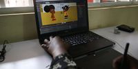 epa08550481 Eguvwe Yugbovwre, 33, who has worked as an animator for seven years, works in her Ajebotoons animation studio in Lagos, Nigeria, 15 July 2020 (issued 16 July 2020). Like Nigerian popular Nollywood films, the animation is fast gaining popularity among young Nigerian entrepreneurs and creatives.  But the once-obscure animation space in Nigeria is also facing challenges of funding, institutional supports, and lack of training facilities.  EPA-EFE/AKINTUNDE AKINLEYE  ATTENTION: This Image is part of a PHOTO SET