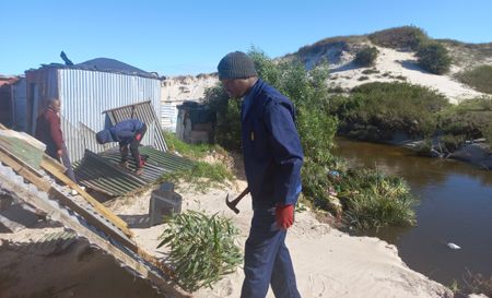 Driftsands families refuse to leave hazardous nature reserve floodplain