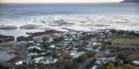 The small coastal suburb of Kommetjie as seen from above on Slangkop Mountain in the deep south of Cape Town. (Photo: Alan van Gysen)