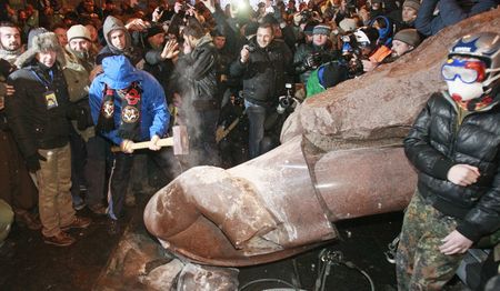 Ukraine: Protesters fell Lenin statue, tell president 'you're next'