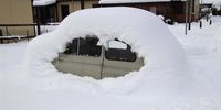 epa10425025 A car is covered after 50-60 cm of snowfall in Norcia (Perugia), Italy, 23 January 2023.  EPA-EFE/GIANLUIGI BASILIETTI