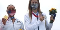 Gold medallist Carissa Moore of Team USA and South Africa's silver medallist Bianca Buitendag at the medal ceremony on day four of the Tokyo 2020 Olympics at Tsurigasaki Surfing Beach in Ichinomiya, Chiba on 27 July 2021. (Photo: Ryan Pierse/Getty Images)