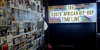 A mood board in the museum showing South Africa’s hip-hop timeline. (Photo: Bridget Hilton-Barber)