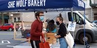 New Yorkers mask up and social distance while shopping outdoors, here at the 'She Wolf Bakery' on 73rd Street. (pic An Wentzel)