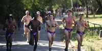 Participants of the annual Daredevil Run only wear a speedo in Johannesburg, South Africa, 13 October 2023. The run around the Zoo Lake area is five km long and the organizers and attendees hope to raise awareness for prostate and testicular cancer in men and is supported by The Cancer Association of South Africa (CANSA), a non-profit leader in the fight against cancer since 1931.  EPA-EFE/KIM LUDBROOK