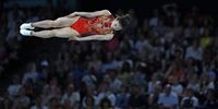 Yicheng Hu of China competes in the Women Final of the Trampoline Gymnastics competitions in the Paris 2024 Olympic Games, at the Bercy Arena in Paris, France, 02 August 2024.  EPA-EFE/MOHAMMED BADRA