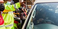 Gauteng MEC for Transport Jacob Mamabolo (yellow jacket) chats with a taxi driver at the Bara taxi rank in Soweto, Johannesburg, on 18 August 2021. (Photo: Shiraaz Mohamed)