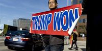 A protester holds a banner reading 'Trump Won' as about six pro-Trump demonstrators protest following the Indictment and arraignment of former President Donald Trump in front of the Federal Building, in Los Angeles, California, USA, 04 April 2023. Former US President Donald Trump was indicted and arraigned in New York Criminal Court and pleaded not guilty to 34 felony charges.  EPA-EFE/ETIENNE LAURENT