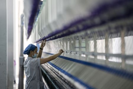 China Factory Inflation Slows in November From 26-Year High