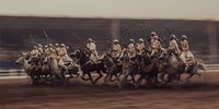 'Knights'. This photograph was taken in November 2022 at a horse festival in Morocco. The picture was taken using a slow shutter speed, while panning the camera to follow the movement of the knights. © Oday Shanshal, United Arab Emirates, Winner, National Awards, Sony World Photography Awards 2023