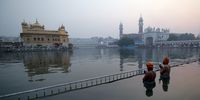 epa07921882 Sikh devotees take a holy dip in the sacred pond of the Golden Temple, the holiest of Sikh's religious sites, early morning on the occasion of the 485th birth anniversary of the fourth Guru or the master of the Sikhs Sri Guru Ramdas Ji in Amritsar, India, 15 October 2019. Sri Guru Ramdas Ji also established the city of Amritsar. The birth anniversary of the fourth Sikh Guru is one of the major religious events for Sikh community, especially for the people of Amritsar.  EPA-EFE/RAMINDER PAL SINGH