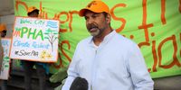 Chairperson of the Philippi Horticultural Area Food and Farming Campaign Nazeer Sonday talks to members of the media on the steps of Cape Town High Court on 15 October 2019, before his campaign’s first court case. (Photo: Tessa Knight)