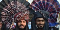 People wear traditional Sindhi attire as they celebrate Sindhi culture celebrations in Karachi, Pakistan, 01 December 2024. Sindhi Culture, one of the oldest cultures in the world that originated around 5,000 years ago, is celebrated all over the world in the month of December.  EPA-EFE/SHAHZAIB AKBER