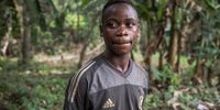 19-year-old Emile Ambili just enrolled in a primary school. He is one of the few Baka who speak French. (Photo: Nathalie Bertrams)