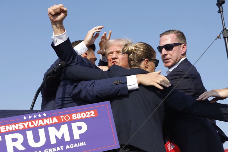 Trump shot in ear at campaign rally after major security lapse