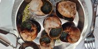 Snails as a starter in a Parisian brasserie. (Photo: Marita van der Vyver)<br>