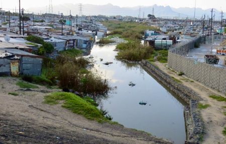 Cape Town residents flee flooded homes to shelter in churches after relentless rainfall