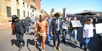 PRETORIA, SOUTH AFRICA - AUGUST 30: King Khoisan SA at the march to the Union Buildings during the  Anti-Vaccine Lockdown Movement of South Africa protest  on August 30, 2021 in Pretoria, South Africa. The group protested mandatory COVID-19 vaccination and the national lockdown restrictions. (Photo by Gallo Images/Laird Forbes)