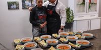 Azraa and Waven just before serving their main course of Cape Malay prawn curry with butter rotis and a pineapple and chilli salad. (Photo: Supplied)