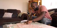 Joseph ‘Travel Mufasa’ Makowa charts a path to walk around Zimbabwe. (Screengrab: Wild Africa Fund)