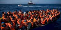 AT SEA - MARCH 29: Migrants of different nationalities wait in the wooden boat in which they traveled to be transferred to the vessel of the Spanish NGO Open Arms on March 29, 2021 in At Sea, Unspecified. The Spanish NGO Open Arms rescued passengers in two wooden boats, with 84 and 97 people respectively. The Open Arms vessel now has a total of 219 migrants, rescued in the Malta SAR (Search and Rescue) zone. (Photo by Carlos Gil/Getty Images)