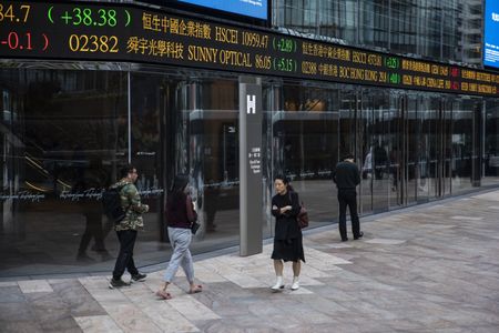 Shares fall in Asia as Nvidia curbs fan worries, gold hits record