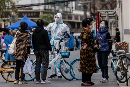 Shanghai expands Covid-19 lockdown as new daily cases surge by a third