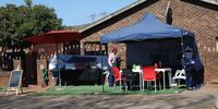 Vendors prepare food near the Lucas Moripe stadium in Attridgeville Pretoria on 25 June 2025. (Photo: Felix Dlangamandla)