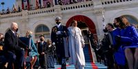 WASHINGTON, DC - JANUARY 20:  Singer Jennifer Lopez arrives to perform "This Land is Your Land" as President-elect Joe Biden (L) and Vice President-elect Kamala Harris (R) look on on the West Front of the U.S. Capitol on January 20, 2021 in Washington, DC.  During today's inauguration ceremony Joe Biden becomes the 46th president of the United States. (Photo by Andrew Harnik-Pool/Getty Images)