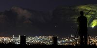 The iconic Table Mountain lit up for the fighters and survivors and those who have passed away from childhood cancer in Cape Town Tuesday, October, 6, 2020. The international awareness symbol for Childhood Cancer is a gold ribbon. This ribbon symbolises all forms of cancer affecting children and adolescents, unlike other ribbons, which focus on one particular cancer. Photo: Nardus Engelbrecht