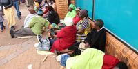 VBS Mutual Bank customers queue outside the branch, hoping to withdraw money they saved for stokvels and burial societies on 20 June 2018 in Thohoyandou, South Africa. (Photo: Gallo Images / Sunday Times / Antonio Muchave)