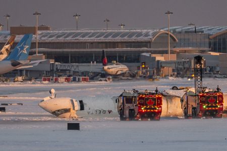 Delta plane flips upside down on landing at Toronto airport, injuring 18