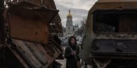 KYIV, UKRAINE - FEBRUARY 02: A woman looks at destroyed Russian military vehicles on display in Mykhailivskyi Square, on February 2, 2023 in downtown Kyiv, Ukraine. February 24 will mark one year since Russia's large-scale invasion of Ukraine. In the time since, fighting has largely concentrated in the east and south of the country, but the capital remains the target of regular air strikes. (Photo by Roman Pilipey/Getty Images)