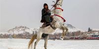 epa10425036 An Afghan rides a horse in Kabul, Afghanistan, 23 January 2023. At least 104 people have been killed in Afghanistan by a powerful cold wave and flash floods in recent weeks, according to the disaster management ministry. Extremely low temperatures, with the minimum dropping to -20 degrees Celsius, and widespread snowfall in large parts of the country including the capital has also resulted in the death of around 70,000 head of cattle.  EPA-EFE/STRINGER