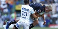 Otere Black of the Blues (L) tackles Pieter-Steph du Toit of the Stormers (R) during the Super Rugby match between the Stormers of South Africa and the Blues of New Zealand at Newlands Stadium in Cape Town, South Africa, 29 February 2020.  EPA-EFE/NIC BOTHMA