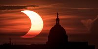 epa09259307 A handout picture made available by the National Aeronautics and Space Administration (NASA) shows a partial solar eclipse as the sun rises to the left of the United States Capitol Building, 10 June 2021, as seen from Arlington, Virginia. The annular or ?ring of fire? solar eclipse is only visible to some people in Greenland, Northern Russia, and Canada.  EPA-EFE/NASA HANDOUT / Bill Ingalls  HANDOUT EDITORIAL USE ONLY/NO SALES