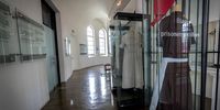 A permanent exhibit of a black prisoner’s uniform among other uniforms at the women’s jail. (Photo: Shiraaz Mohamed)