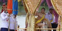 Thai Princess Sirivannavari Nariratana (2-R) and Prince Dipangkorn Rasmijoti (R) greet well-wishers while seated on the Royal Barge during the Royal Barge Procession for the Royal Kathin ceremony, which took place along the Chao Phraya River in Bangkok, Thailand,  27 October 2024. Thousands of Thai oarsmen rowed more than 50 historic barges in a parade along the Chao Phraya River for the Royal Kathin celebration, which commemorated Thai King Maha Vajiralongkorn's 72nd birthday. The Kathin Festival is a customary Buddhist celebration that takes place in the eleventh month of the Thai lunar calendar, featuring offering ceremonies, including the presentation of new saffron robes to Buddhist monks.  EPA-EFE/NARONG SANGNAK