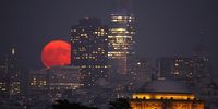 A full blue moon rises behind the San Francisco skyline on 30 August, 2023 in San Francisco, California. The next super blue moon will not appear until 2037. (Photo: Justin Sullivan/Getty Images)