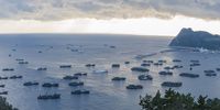 An armada of more than 200 Chinese squid boats flock to the bay of Ulleung Island, South Korea, to ride out a storm. May 2019 (Photo: The Outlaw Ocean Project/Fábio Nascimento)
