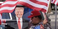 Supporters of former President Donald Trump gather near the entrance to the Trump National Doral Miami golf course for a rally to show support for Trump in Doral, Florida, USA, 12 June 2023. Trump is facing multiple federal charges stemming from an US Justice Department investigation led by Special Counsel Jack Smith related to the former president’s alleged mishandling of classified national security documents and is scheduled to turn himself into authorities on Tuesday in Miami.  EPA-EFE/JUSTIN LANE
