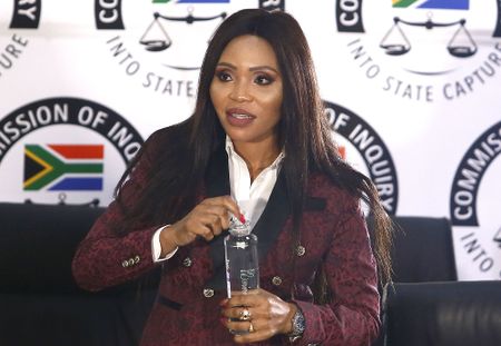 Estranged wife alleges Gigaba turned to the Guptas for help amid family financial pressures